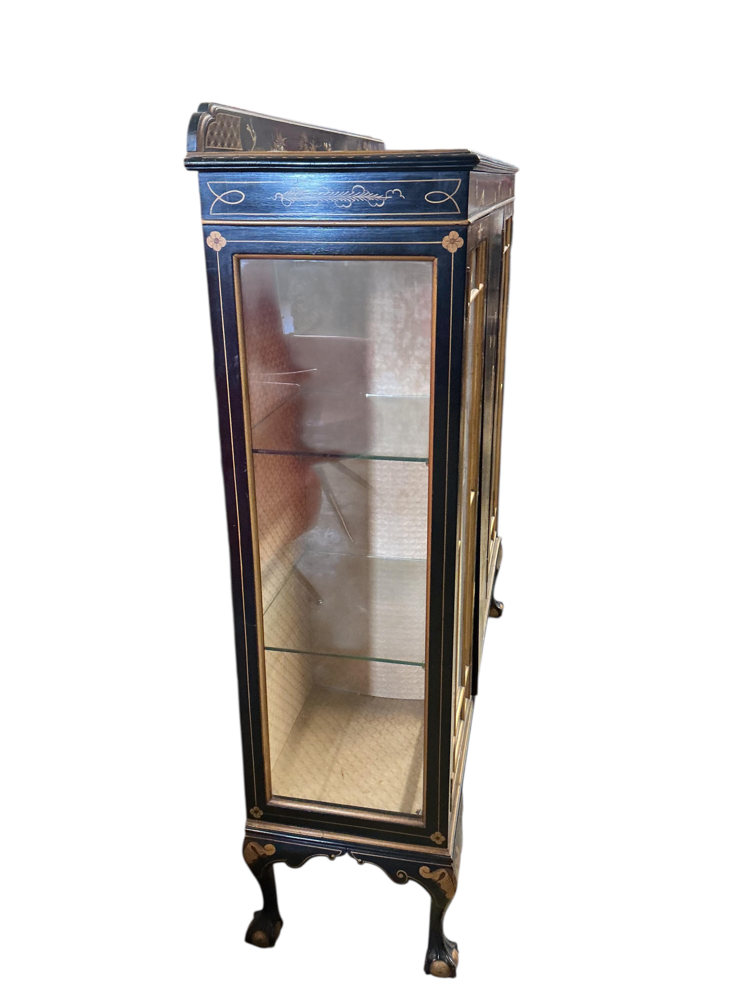 An early 20th century chinoiserie lacquer display cabinet, width 124cm, depth 34cm, height 130cm